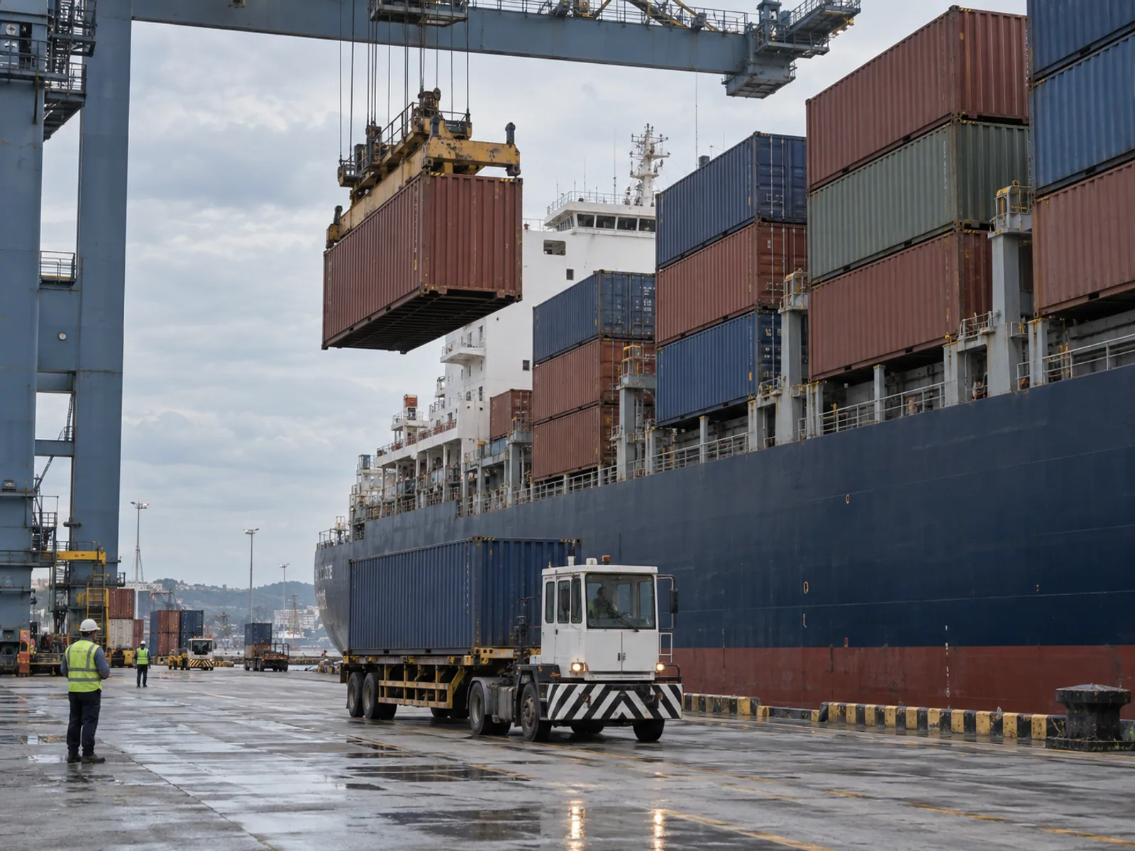 A container is lifted between a vessel and a working terminal.